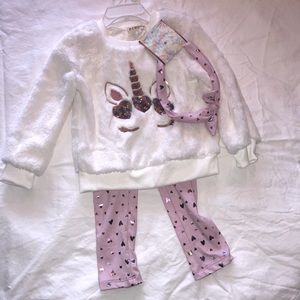 Between unicorn outfit